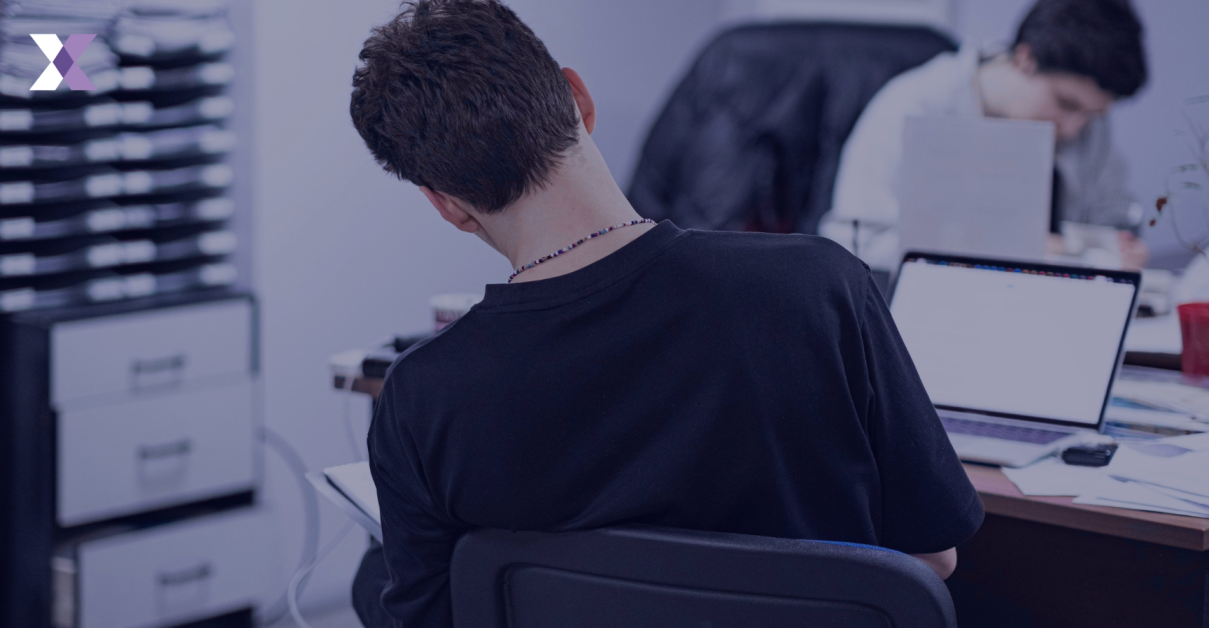 Two men working in an office to show real-world governance transformation in action