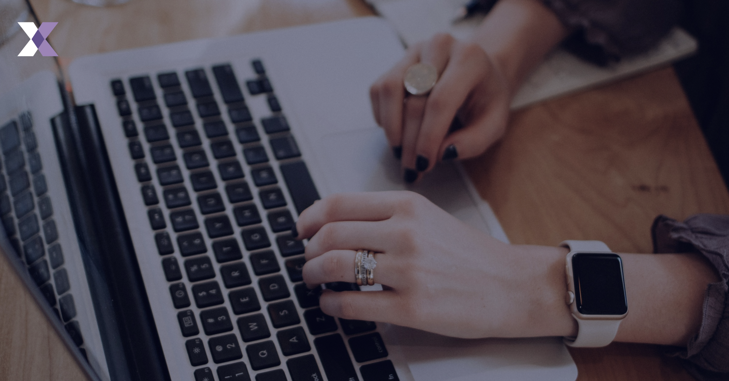 women using the laptop to understand proxy voting guidelines in modern markets