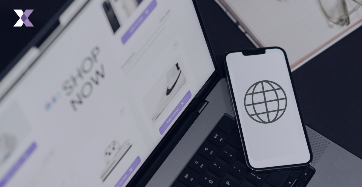 A phone with the SWIFT logo on a laptop screen to represent understanding ISO 20022 and its global impact