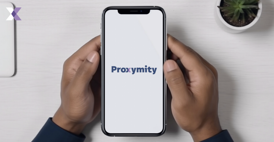 a person hold a phone with Proxymity logo on it